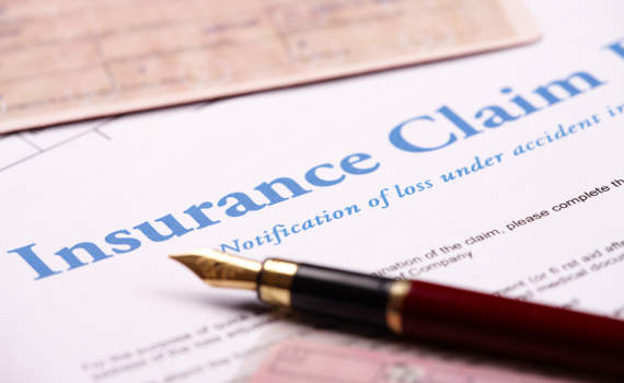 filling in an insurance claim form